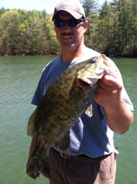 Isreal Gibson, with his not so small, smallmouth bass on Lake James